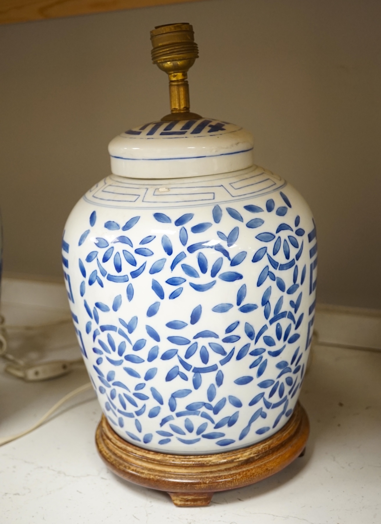 Two Chinese porcelain jars mounted as lamps and a similar blue and white octagonal jardiniere, largest 35cm wide. Condition - good (3)